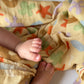 Playtime Whimsy 🍀🌟🫟🟠 Muslin Swaddle