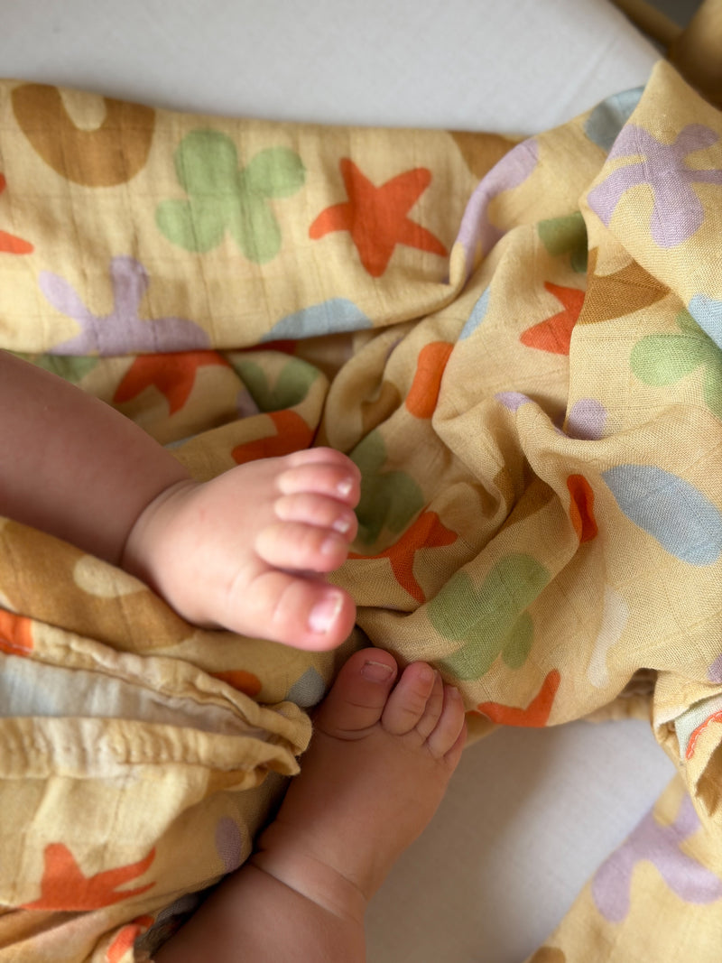 Playtime Whimsy 🍀🌟🫟🟠 Muslin Swaddle
