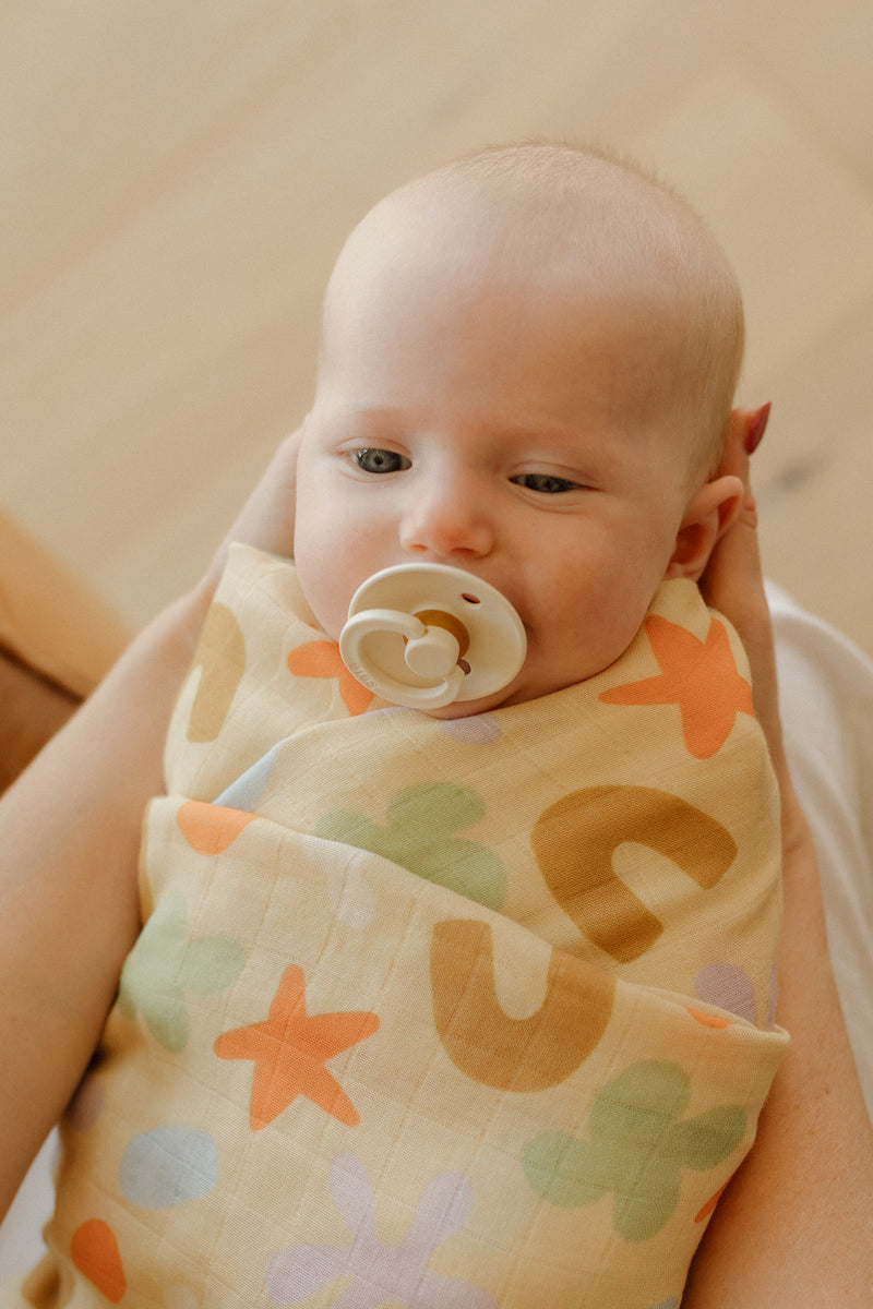 Playtime Whimsy 🍀🌟🫟🟠 Muslin Swaddle