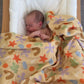 Playtime Whimsy 🍀🌟🫟🟠 Muslin Swaddle