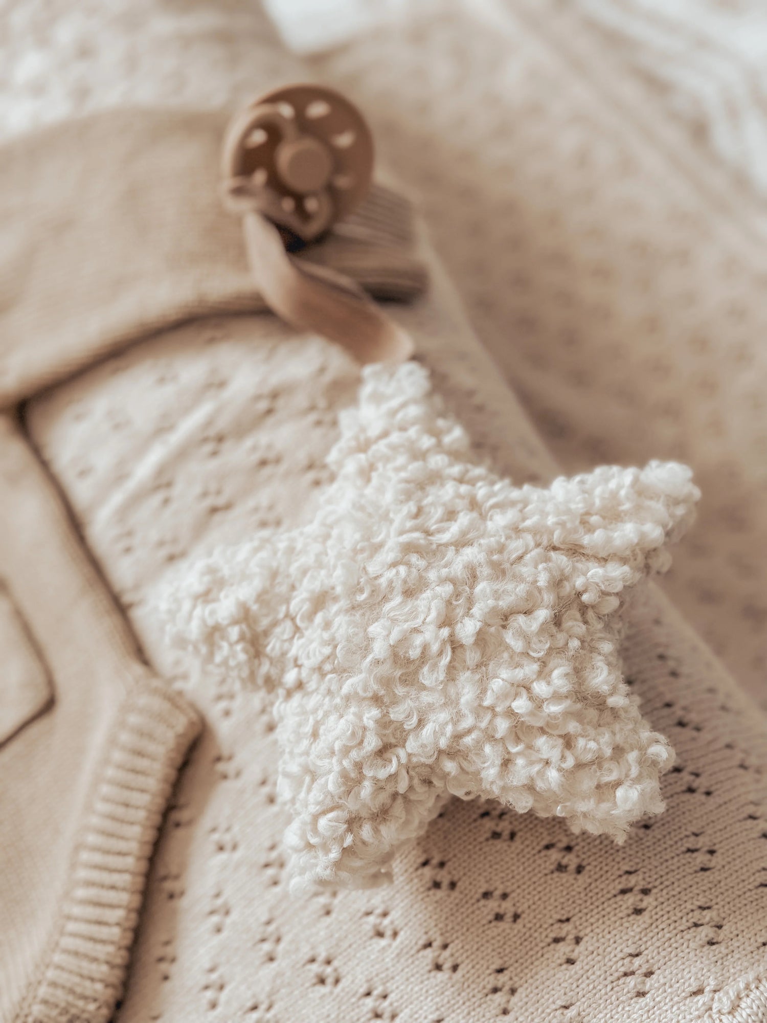 Sherpa star pacifier holder